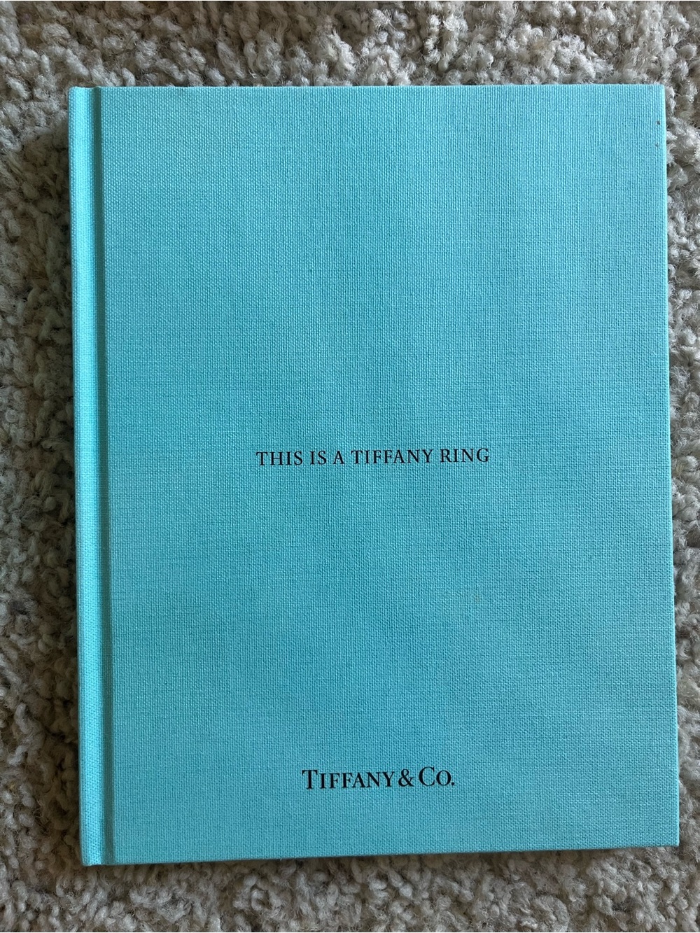 Tiffany & Co. Hardcover “This is a Tiffany Ring” Book in Tiffany Blue - Picture 1 of 8